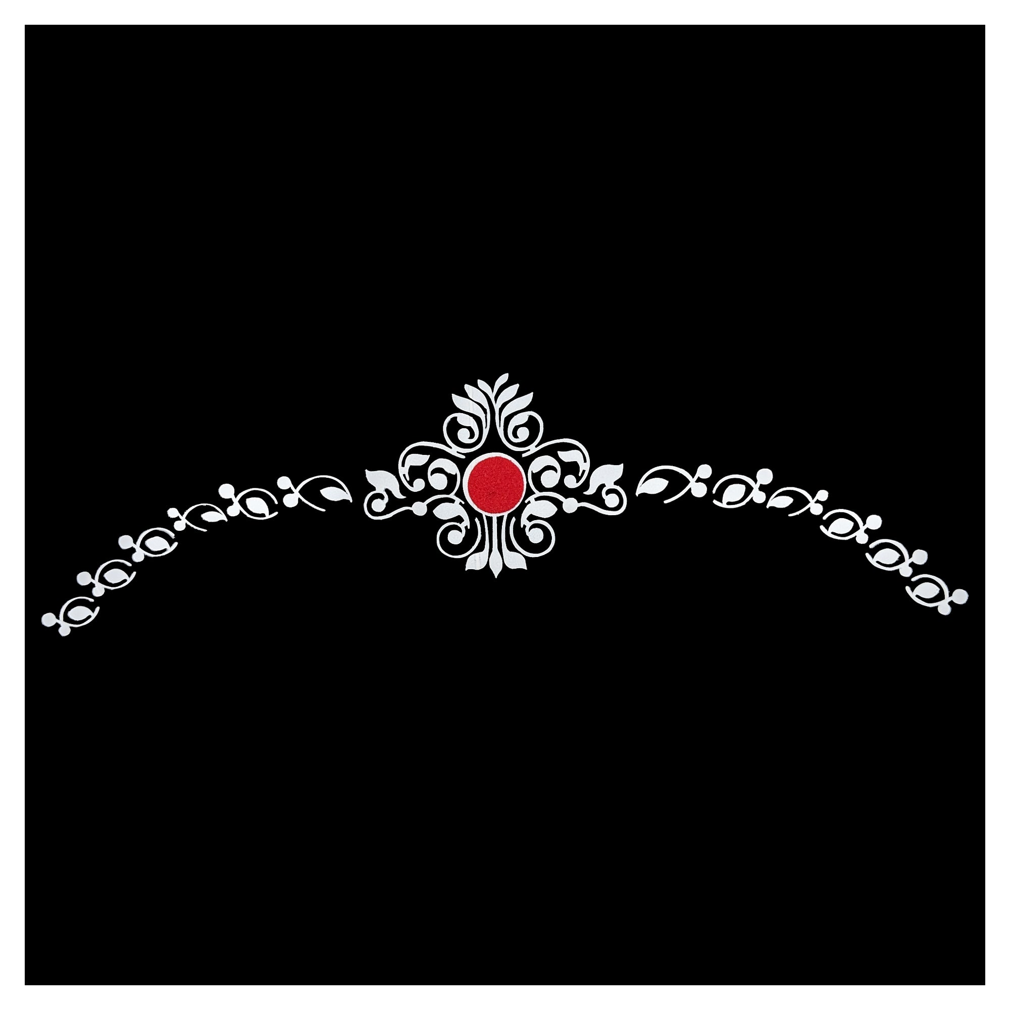 Comet Busters Bengali bridal chandan bindi featuring a red center with intricate white floral traditional Bengali wedding makeup.
