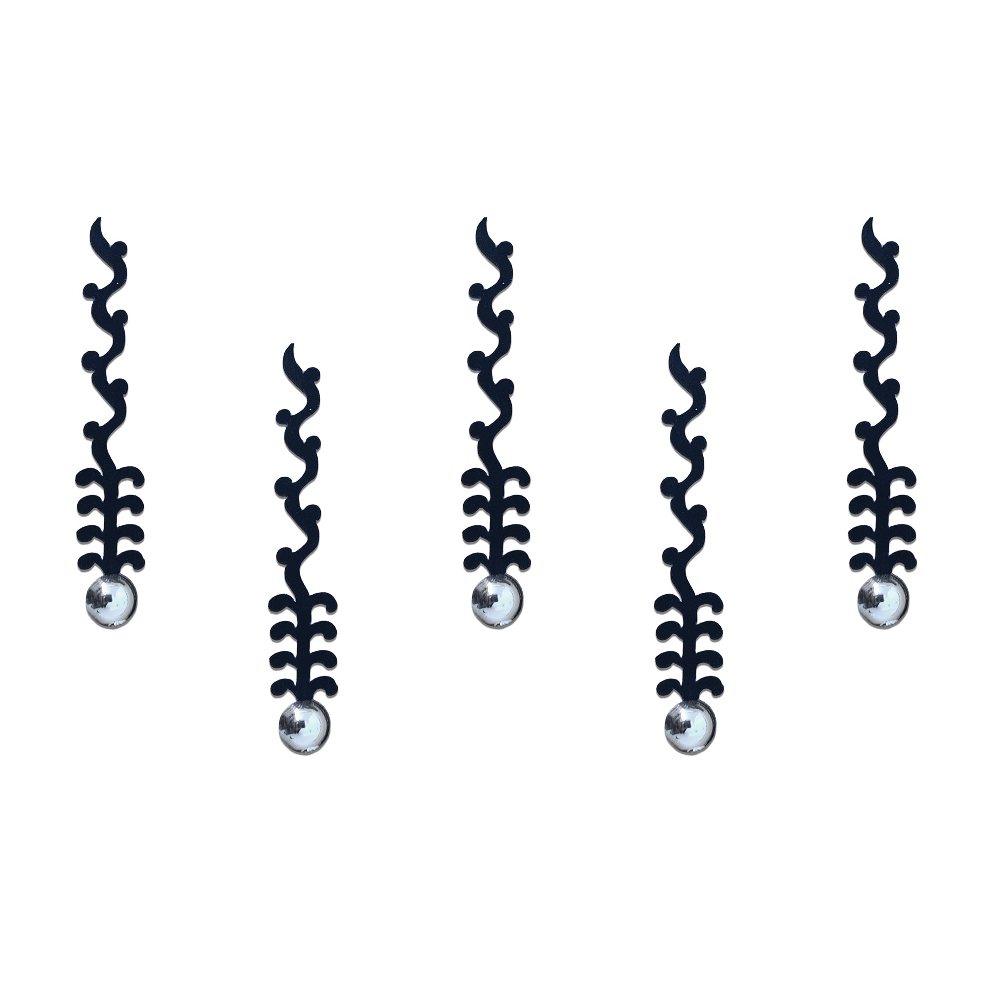 Comet Busters premium black decorative bindi collection showcasing graceful vine-inspired vertical designs with metallic silver pearl accents.