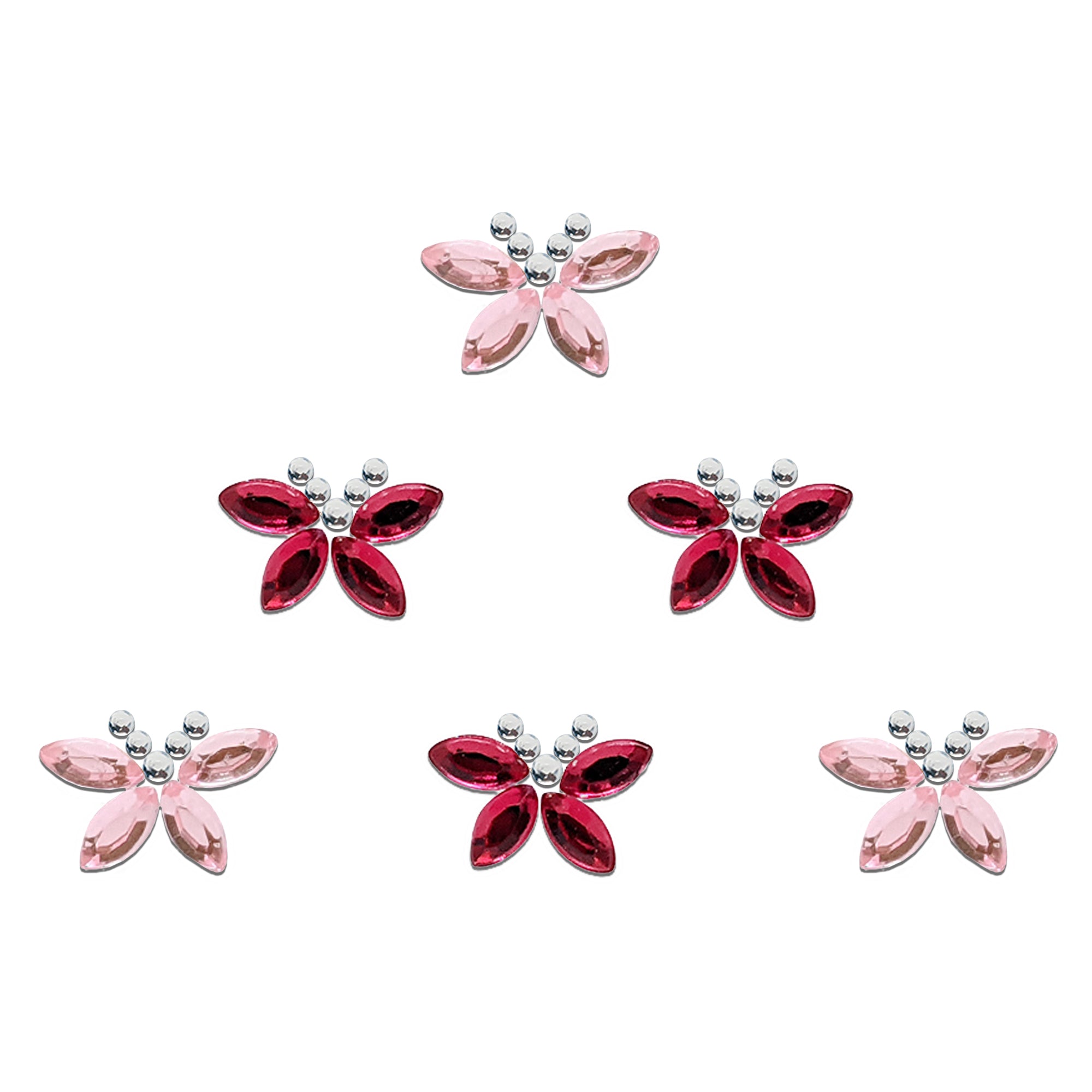 Comet Busters butterfly-shaped designer bindis featuring light pink and magenta reflective teardrop stones with silver crystal accents arranged in an elegant butterfly pattern for festive and ethnic styling.