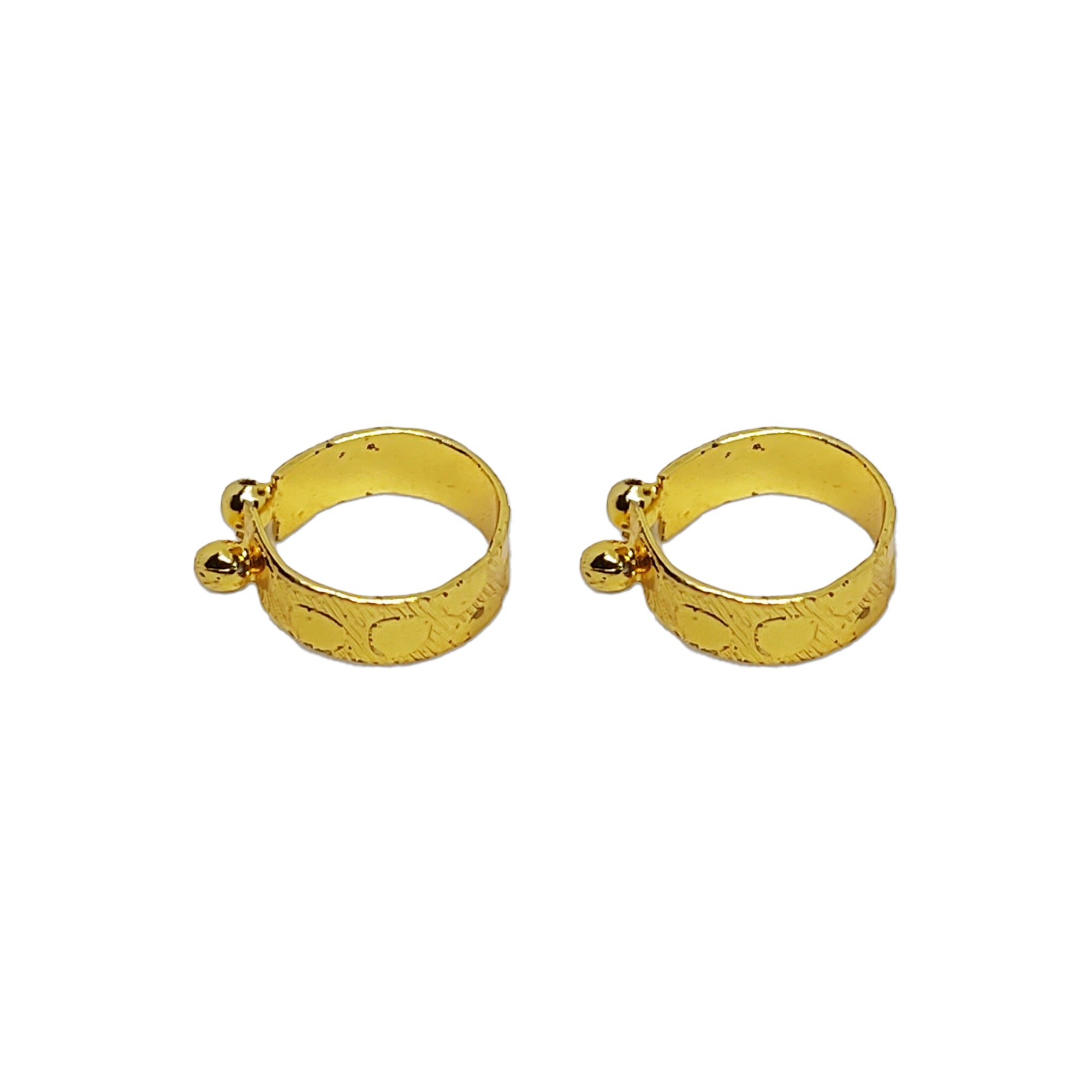 Comet Busters gold-tone engraved broad hoop nose ring with side ball detailing, shown as a pair on a white background.