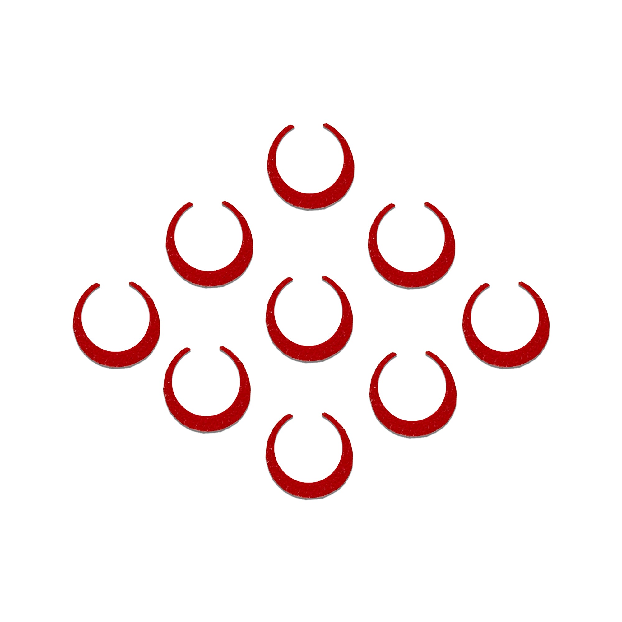 Comet Busters red crescent moon bindis in a traditional Chandra Tilak design.