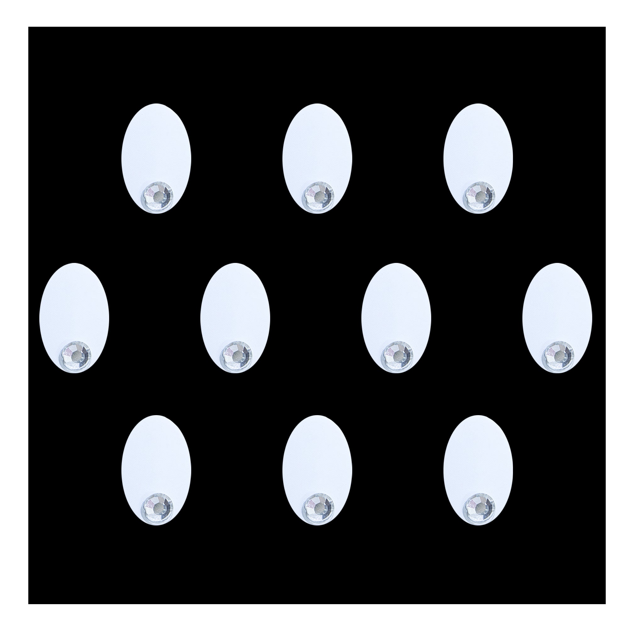 Comet Busters Oval crystal designer bindis featuring a modern geometric silver design with a sparkling crystal accent. Self-adhesive fashion bindis ideal for festive, ethnic, traditional, and contemporary styling.