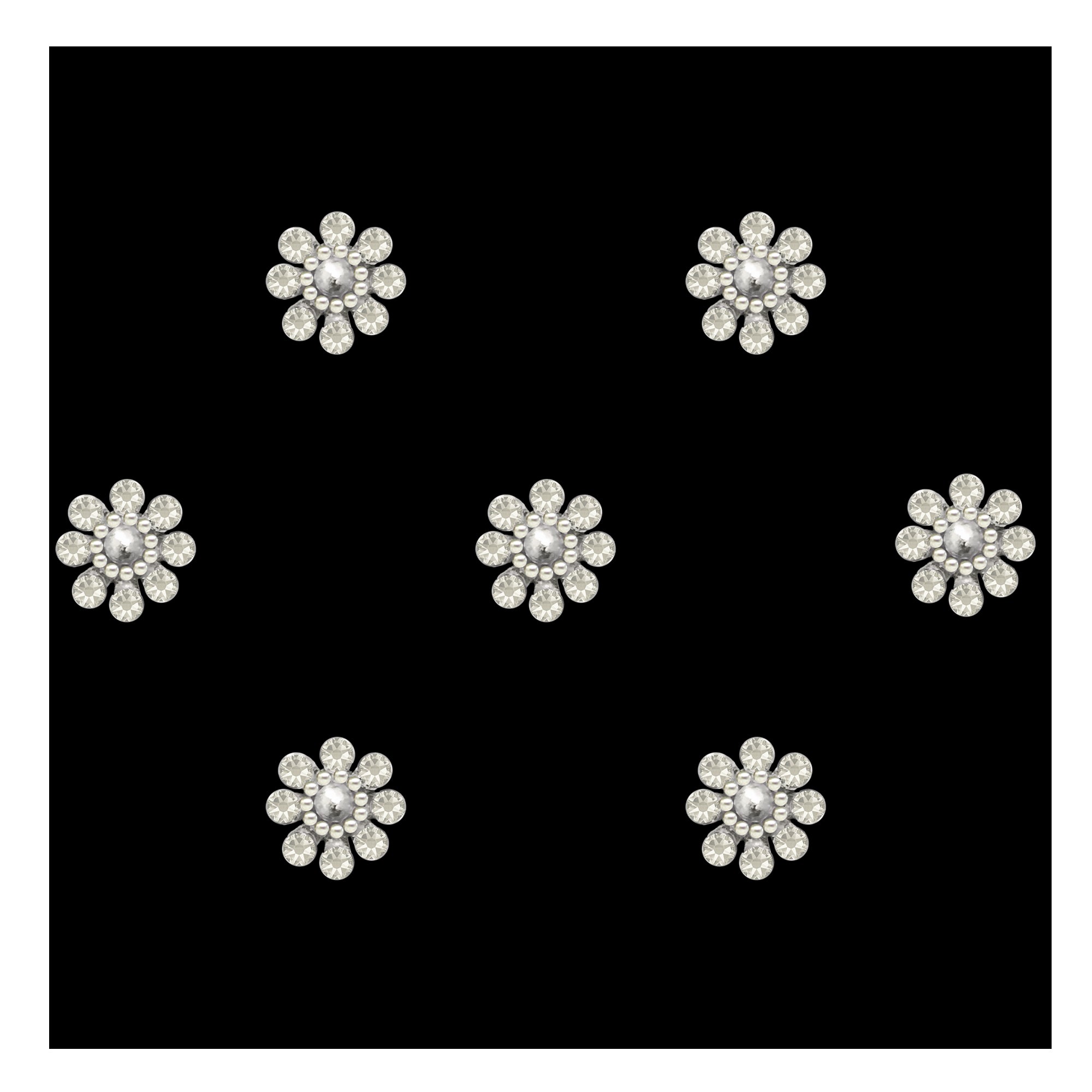 Comet Busters premium silver floral bindis featuring a sparkling central crystal stone surrounded by petal-shaped rhinestones and delicate bead detailing in an elegant flower-inspired designer pattern.