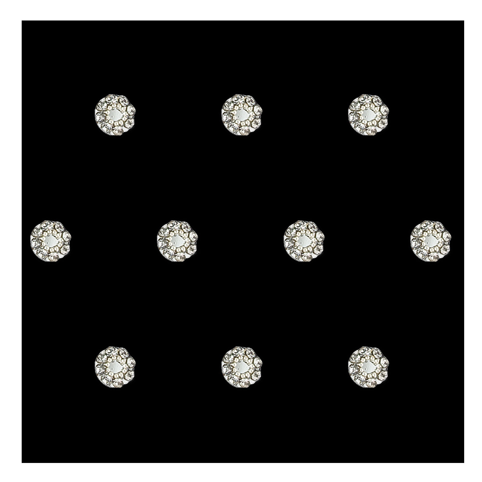 Comet Busters premium silver round bindis featuring a sparkling crystal halo design with a reflective center stone surrounded by elegant rhinestone detailing for festive and party wear styling.