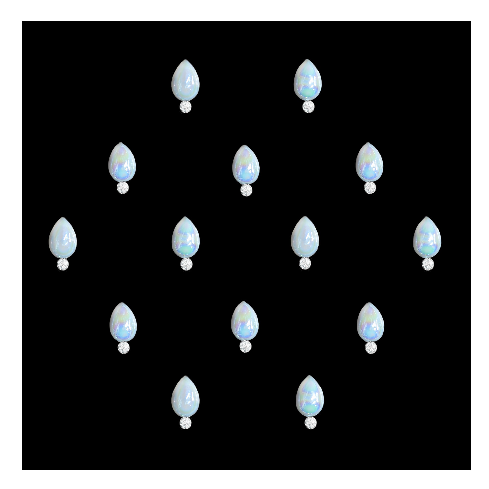 Comet Busters pearl drop stone bindis featuring glossy iridescent white teardrop-shaped stones paired with small crystal accents on a black background, elegant self-adhesive festive bindi set for women and girls.