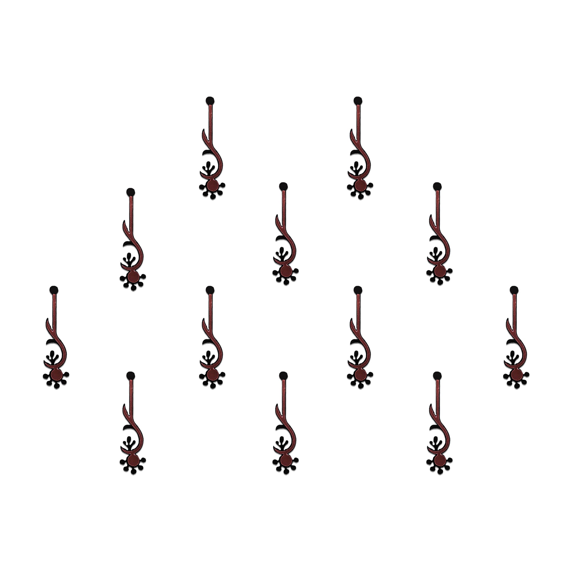 Comet Busters gothic tribal designer bindis featuring elongated black and maroon artistic motifs with abstract ethnic detailing arranged on a light background for a bold fusion-inspired traditional look.