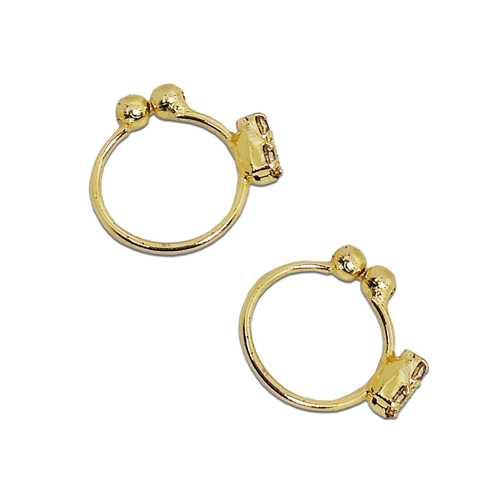 Comet Busters golden hoop nose stud featuring a sleek circular design with a decorative crystal-studded accent, perfect for elegant everyday and traditional looks.