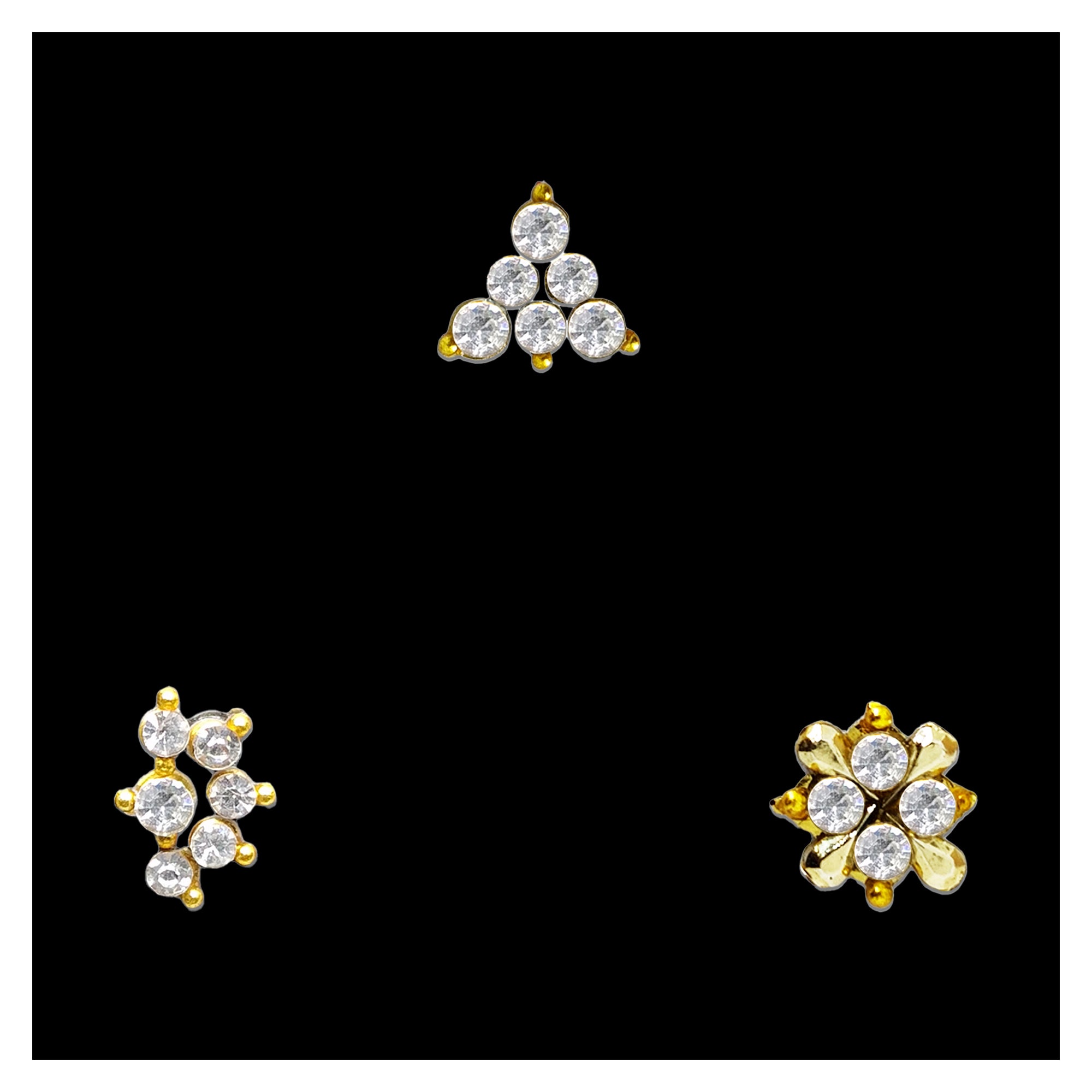 Comet Busters designer stick-on nose stud featuring sparkling clear crystals with elegant gold-tone detailing in multiple decorative designs