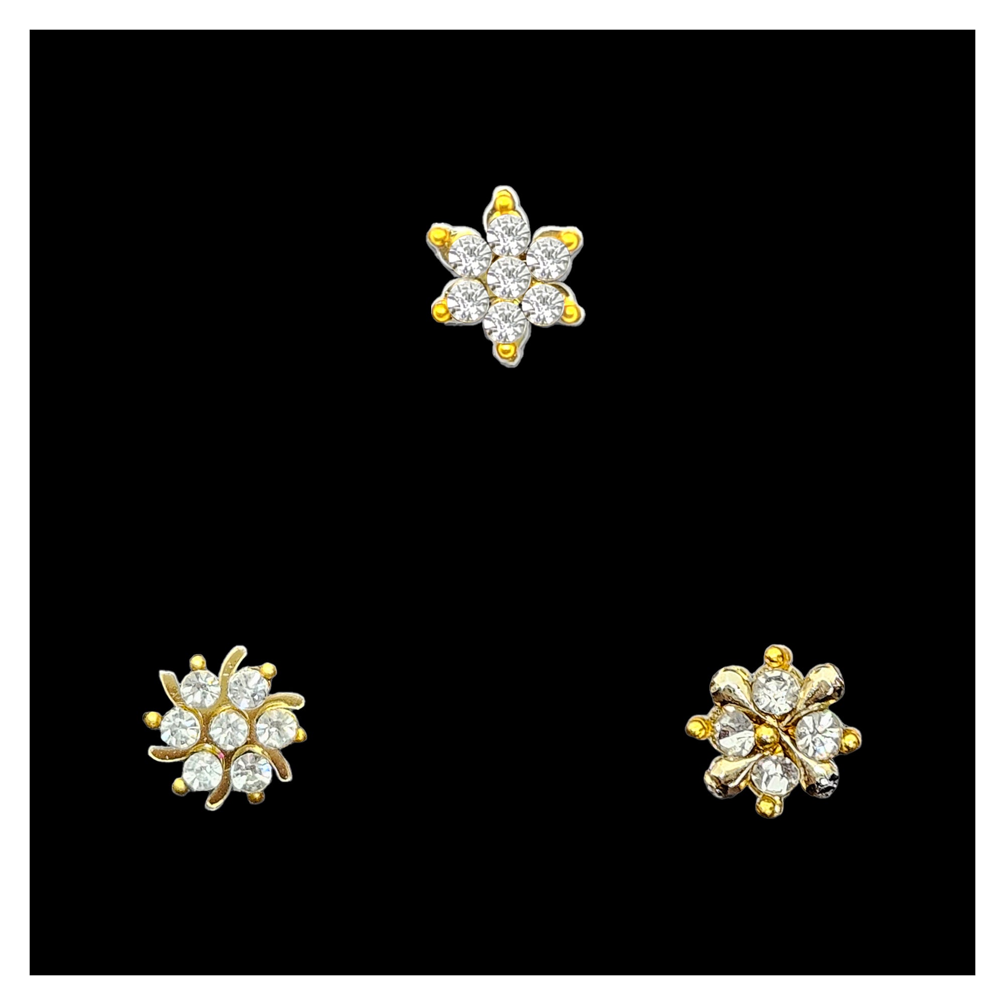 Comet Busters gold tone stick-on nose stud featuring sparkling clear crystals arranged in elegant floral and flower-inspired designer patterns