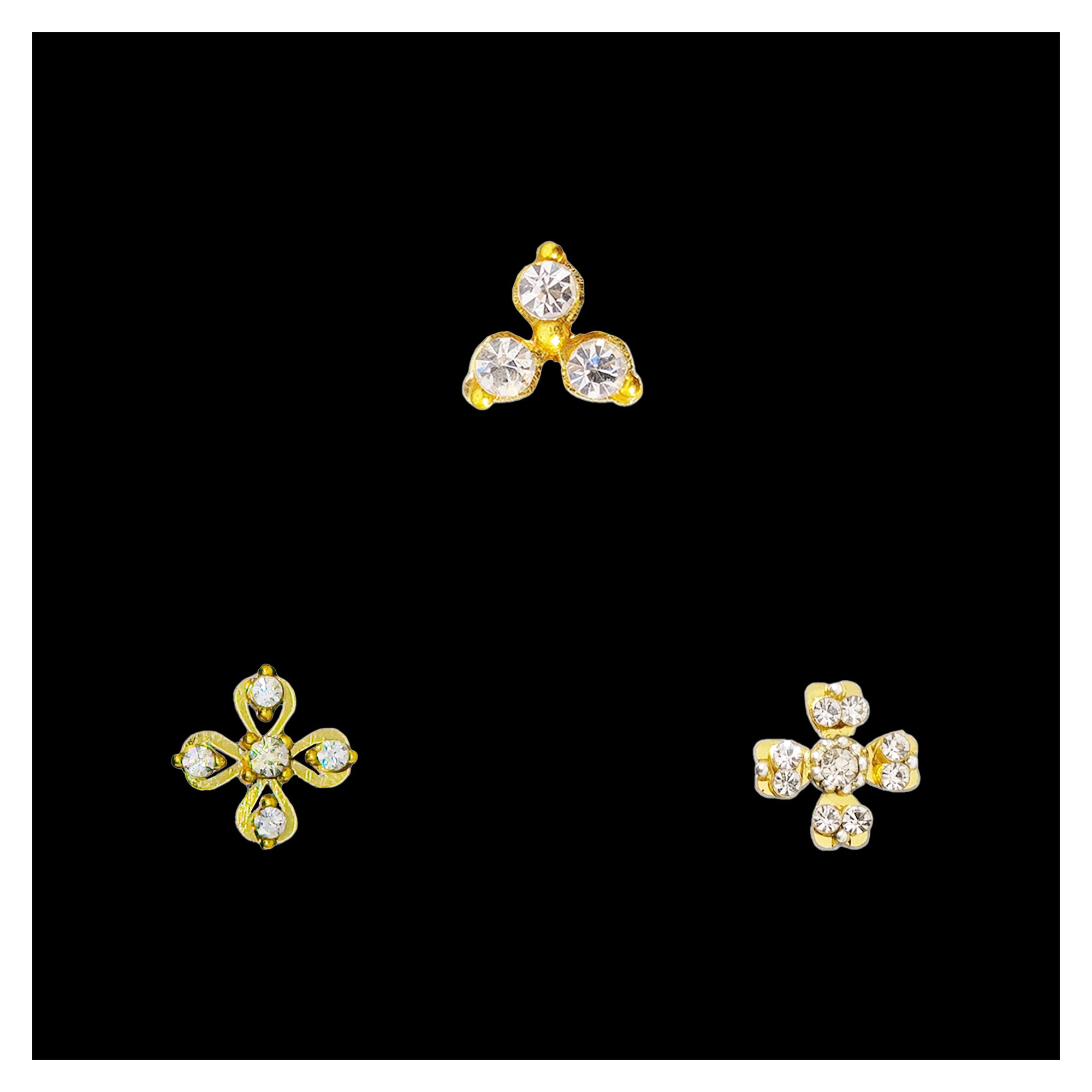 Comet Busters gold tone stick-on nose stud featuring sparkling clear crystals arranged in elegant three-petal and floral-inspired designer patterns