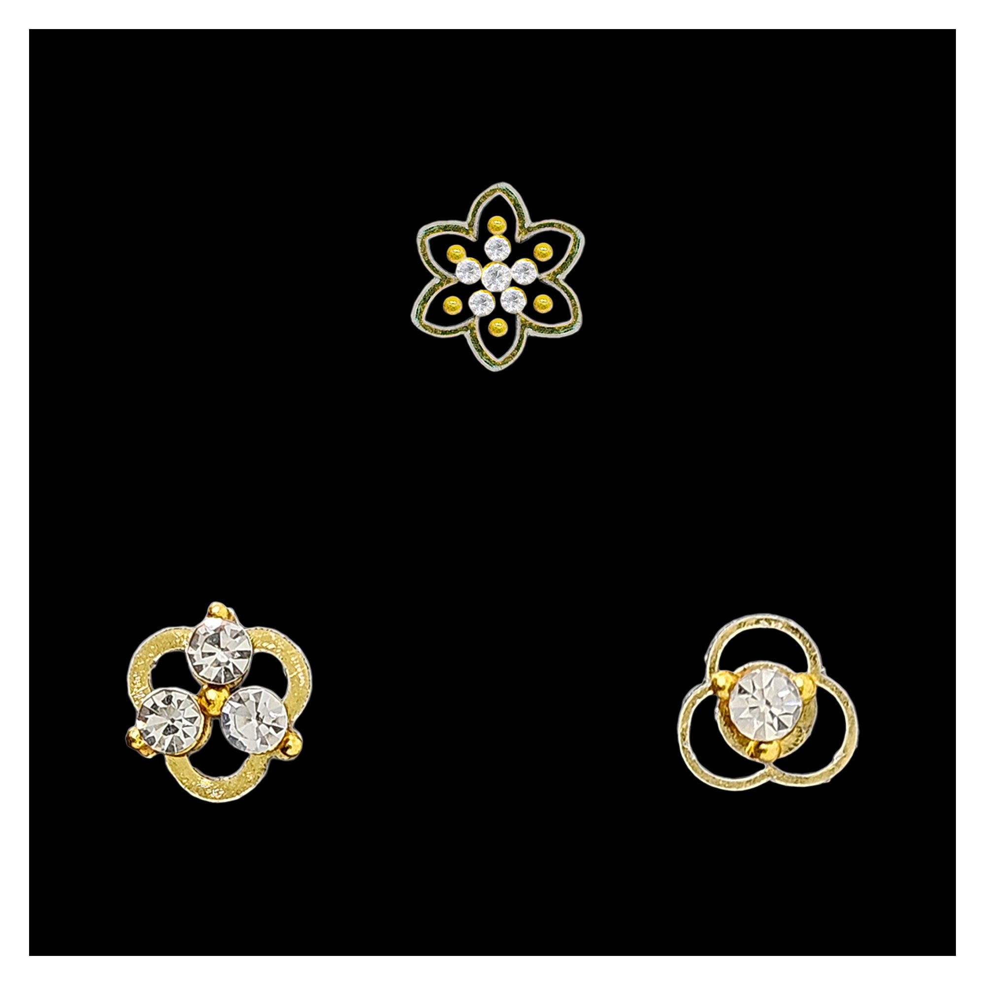 Comet Busters gold tone stick-on nose stud featuring clear sparkling crystals in elegant floral and geometric designs