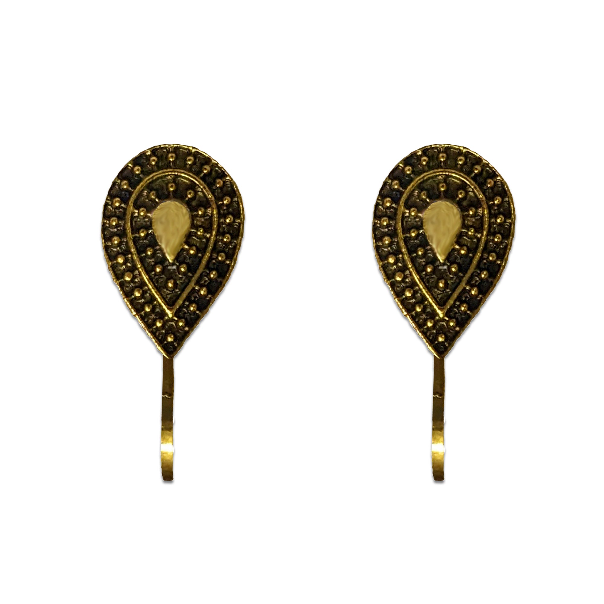Comet Busters golden paisley-inspired nose stud featuring an intricate floral motif, embossed detailing, clear center crystal and a sleek clip-on fitting, perfect for traditional and festive looks.