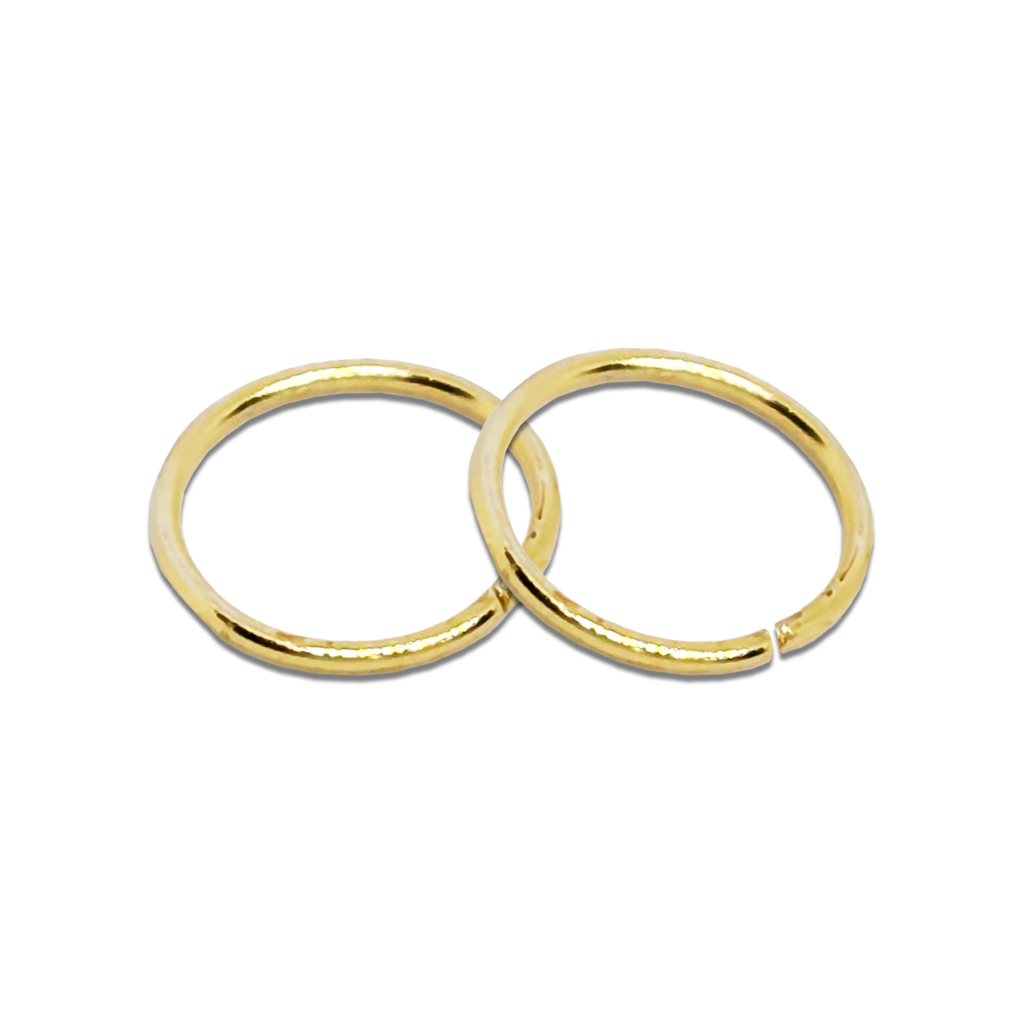 Comet Busters Golden round stick-on nose studs for women, featuring simple circular hoop-style design 