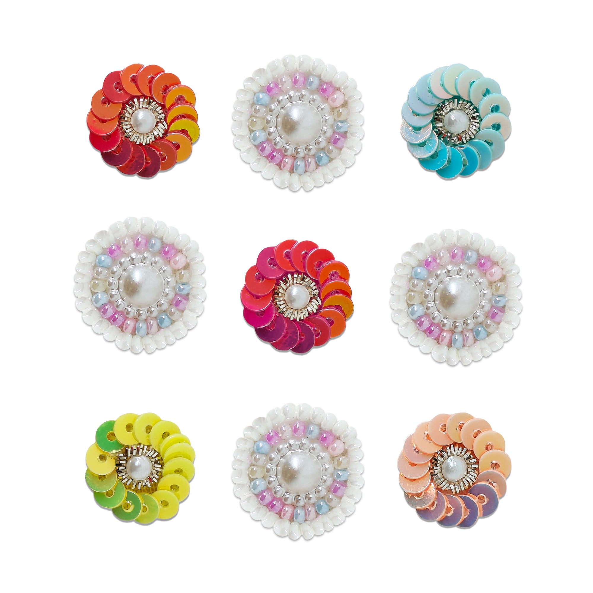 Indira by Comet Busters® premium pearl and sequin designer bindi collection featuring spiral sequin motifs, pearl centers, pastel beadwork, and handcrafted embellishments for women and girls.