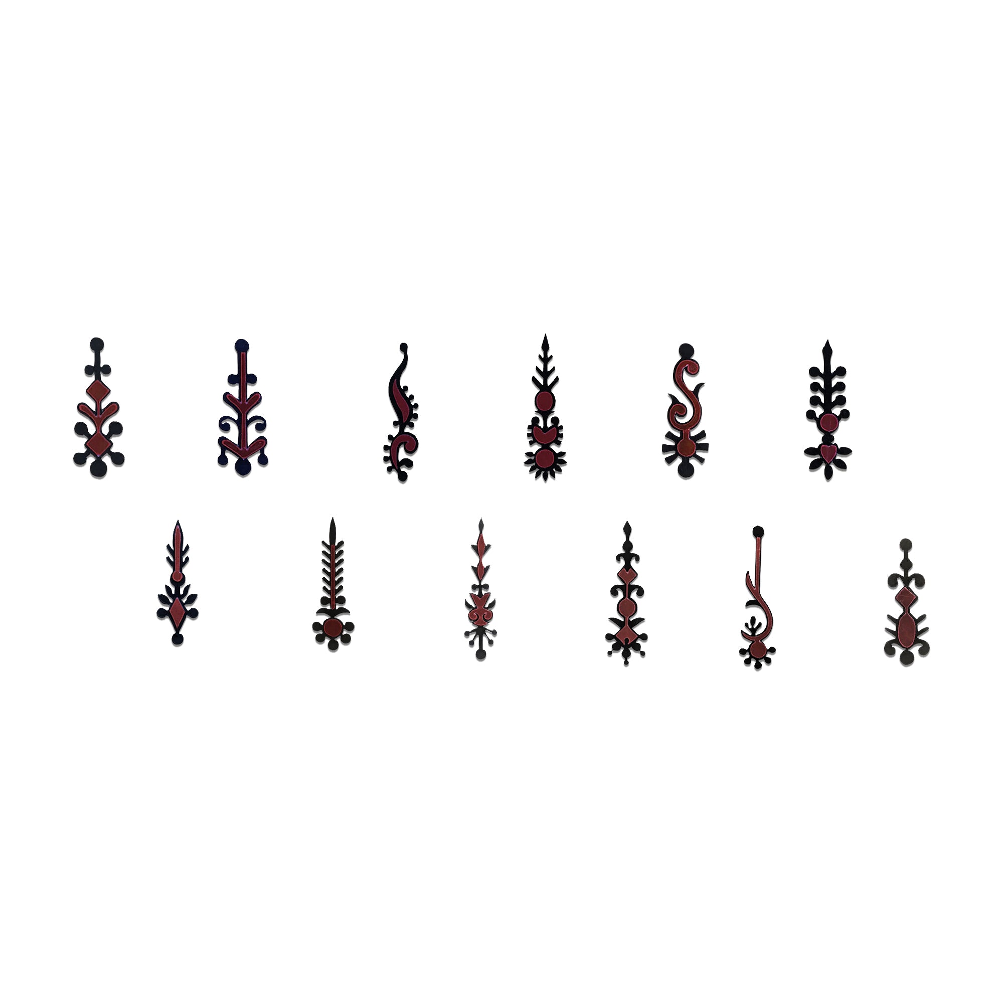 Comet Busters tribal vertical designer bindis featuring intricate black and maroon ornamental motifs in elongated artistic patterns, inspired by ethnic folk and fusion jewelry aesthetics.