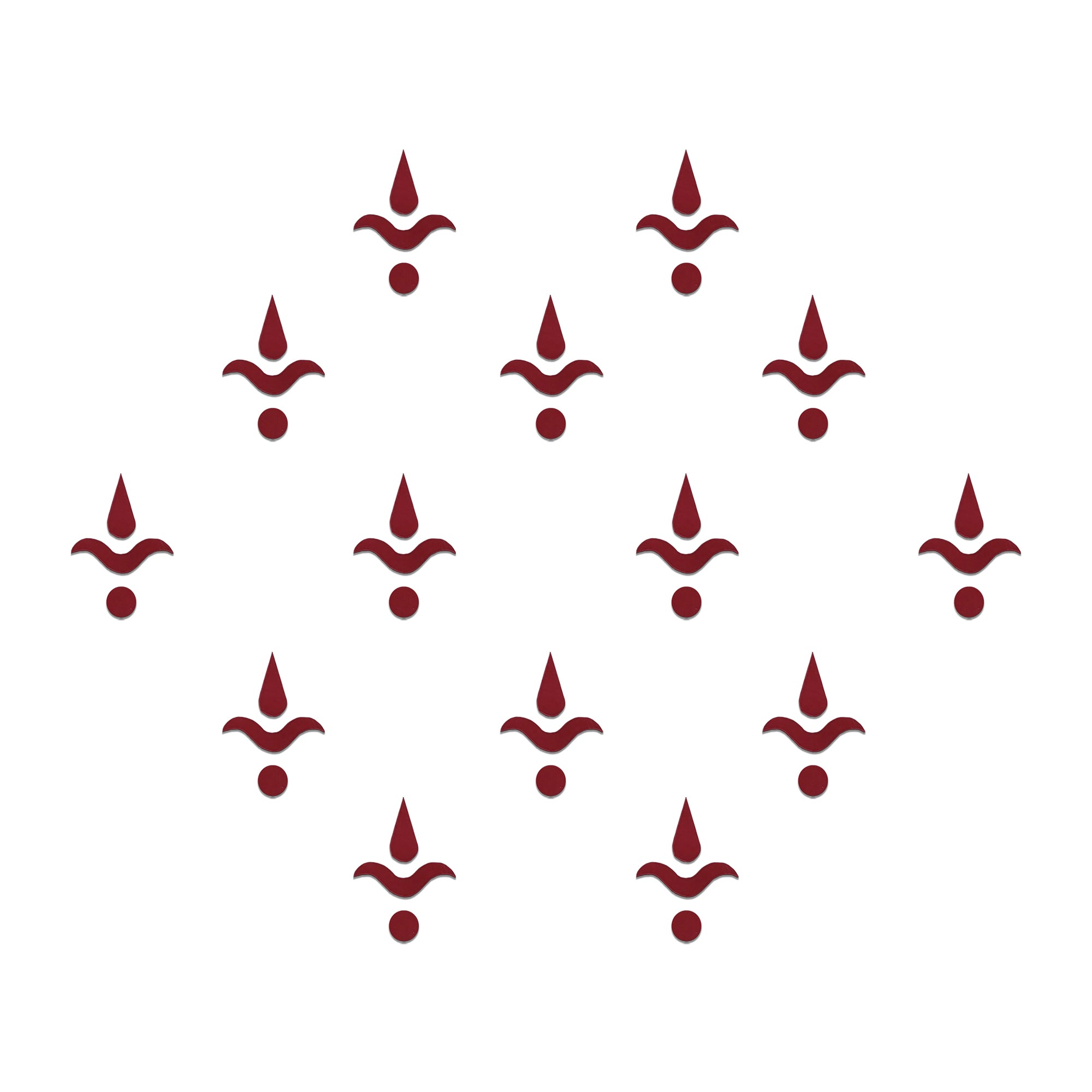Comet Busters Bengali style Maroon bindis with artistic curved design