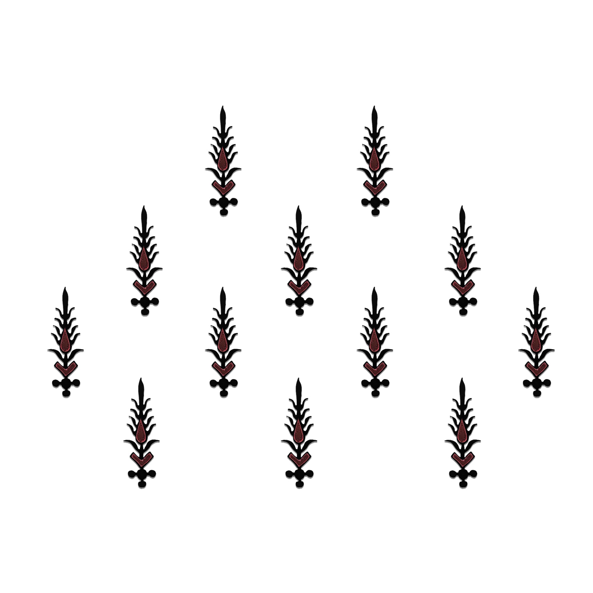 Comet Busters tribal designer bindis featuring black ethnic symbol motifs with a circular red stone center arranged on a light background, offering a bold fusion-inspired traditional look.