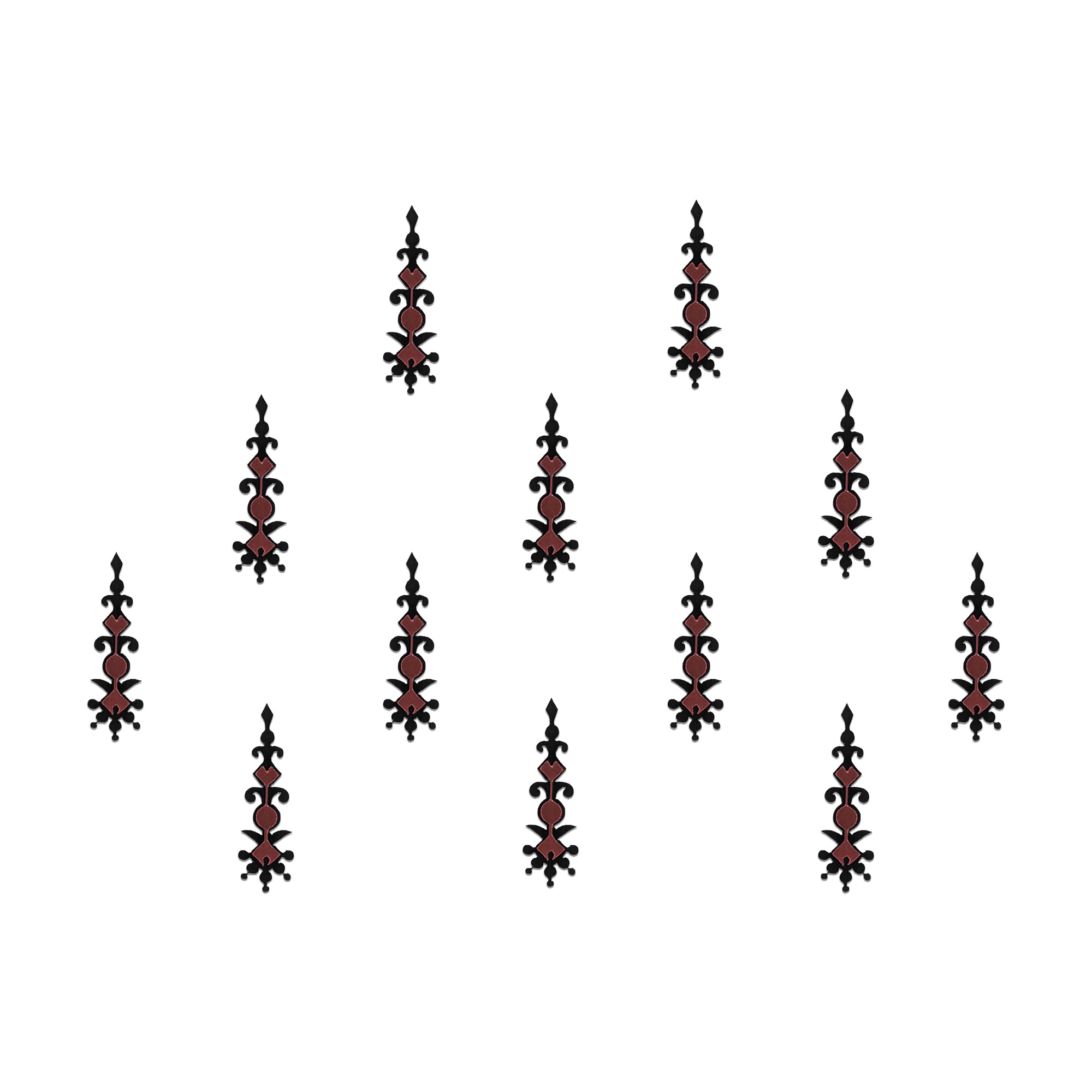 Comet Busters gothic tribal designer bindis featuring elongated black and maroon artistic motifs with abstract ethnic detailing arranged on a light background for a bold fusion-inspired traditional look.