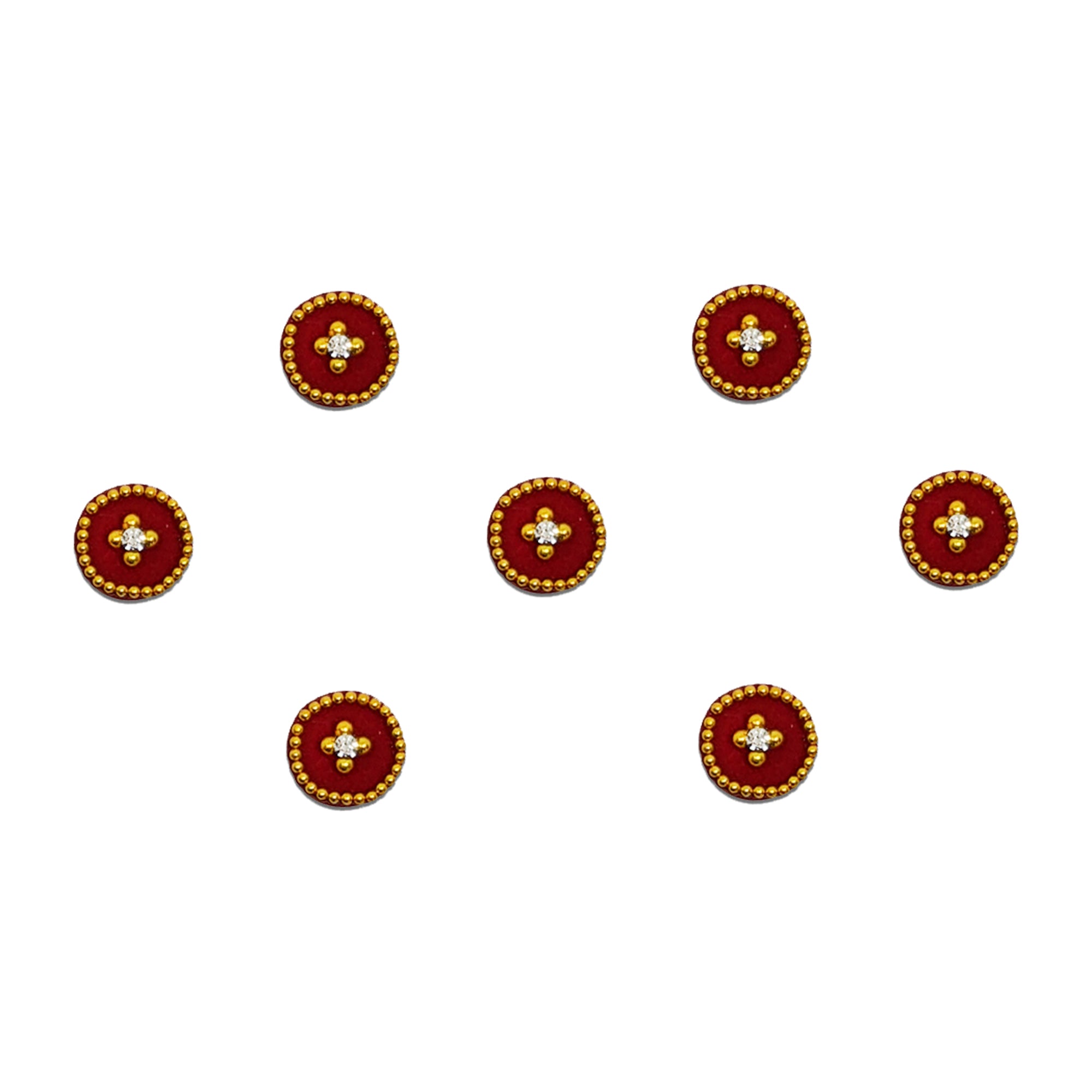 Comet Busters maroon round bindi featuring a central crystal stone surrounded by golden bead detailing and an accent crystal drop, offering a traditional festive look for weddings, cultural occasions, and ethnic wear.