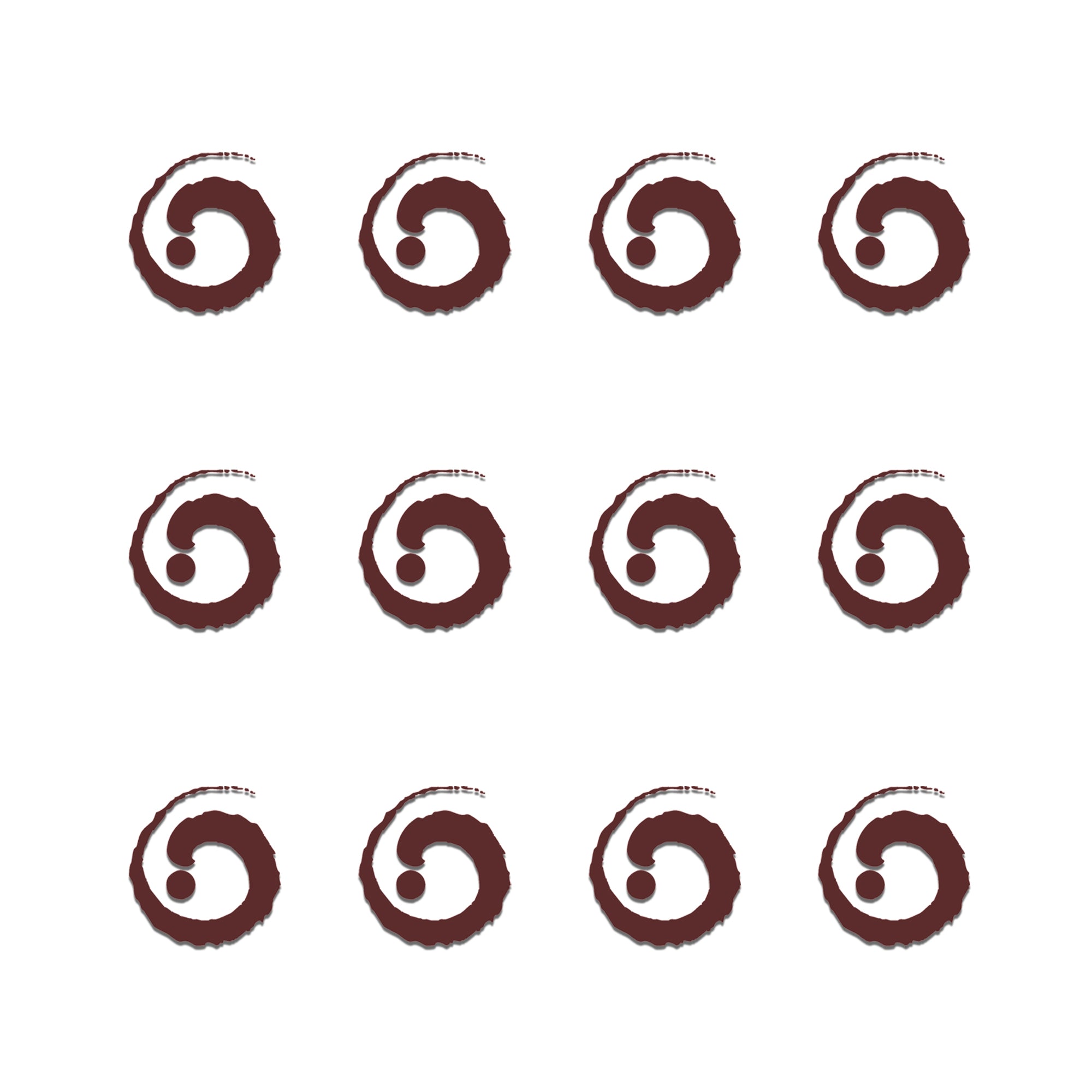 Comet Busters mini maroon spiral bindis featuring artistic circular swirl pattern