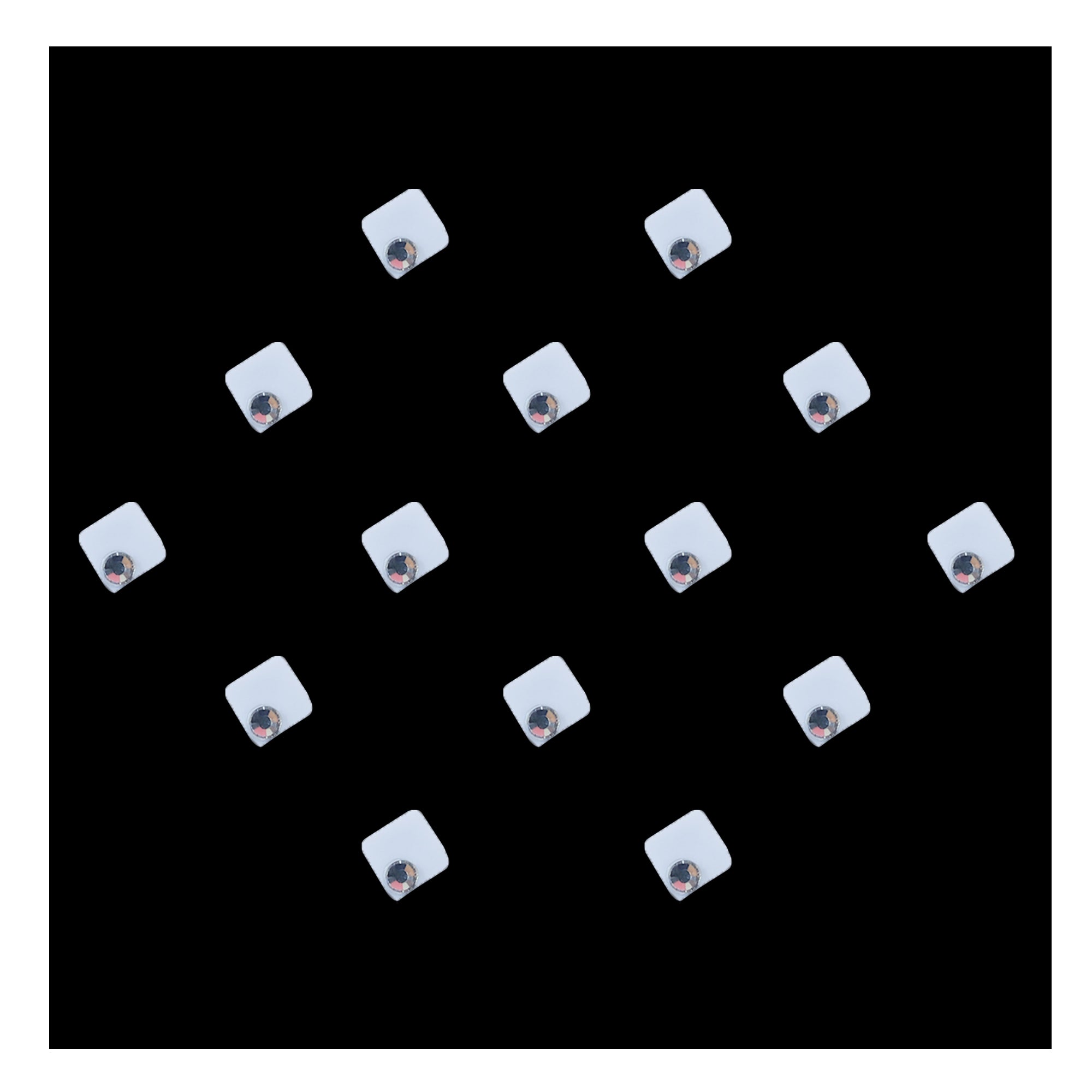 Comet Busters square crystal designer bindis featuring a modern geometric silver design with a sparkling crystal accent. Self-adhesive fashion bindis ideal for festive, ethnic, traditional, and contemporary styling.