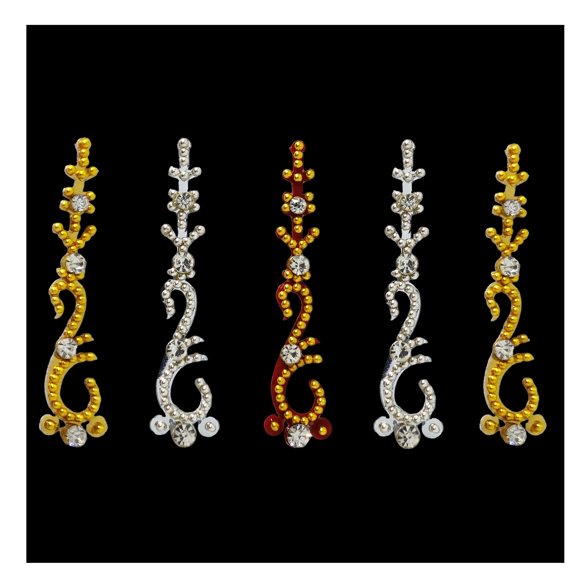 Comet Busters dual-tone designer long bindis featuring gold and silver finishes with pearl bead centers, sparkling crystal accents, and elegant linear detailing. Self-adhesive forehead bindis perfect for weddings, festivals, bridal wear, puja, parties, classical dance, and traditional ethnic outfits.