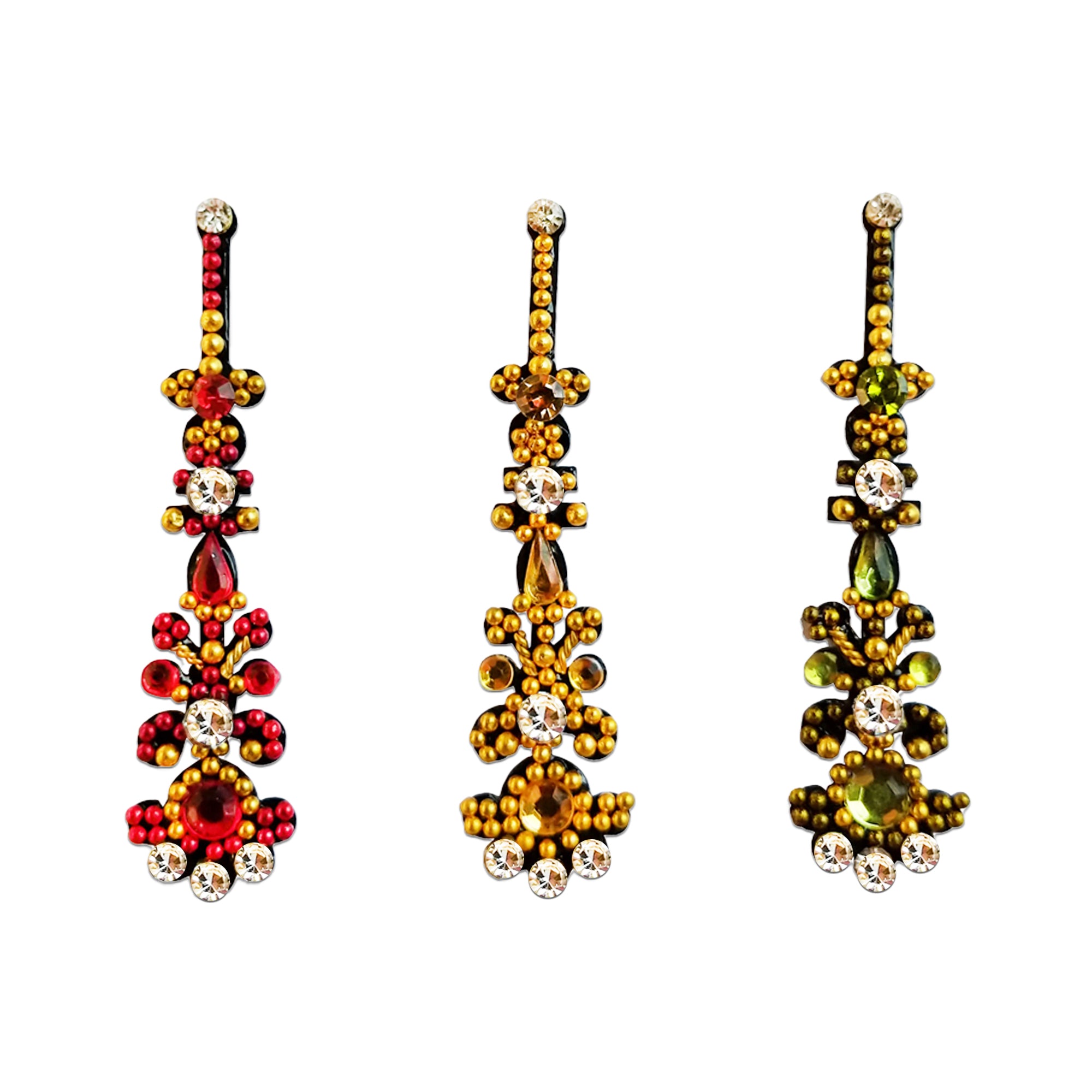Comet Busters multicolor long designer bindi set featuring red, amber, and olive green gemstone accents with gold bead detailing, sparkling crystals, and floral-inspired embellishments. Premium self-adhesive bindis for women and girls, perfect for bridal wear, weddings, festivals, parties, cultural events, and traditional ethnic styling.