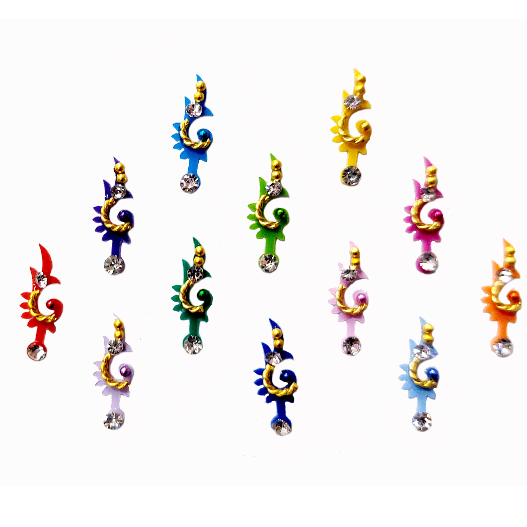 Comet Bisters multicolor musical note inspired bindis featuring sparkling crystal stones, glitter accents, and artistic swirl detailing for festive and ethnic wear.