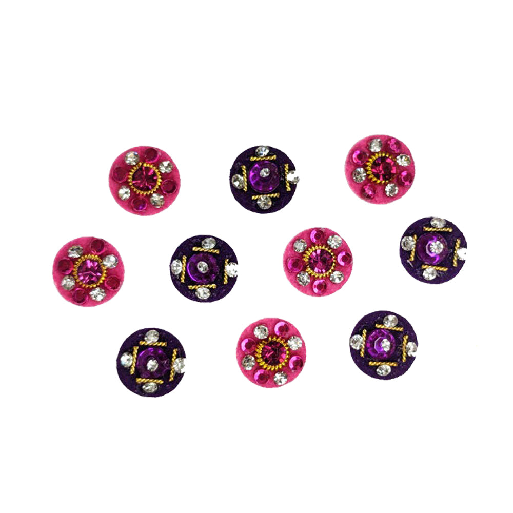 Comet Busters pink and purple velvet round bindi with crystal center, rhinestones and golden bead accents for festive, bridal and ethnic wear.