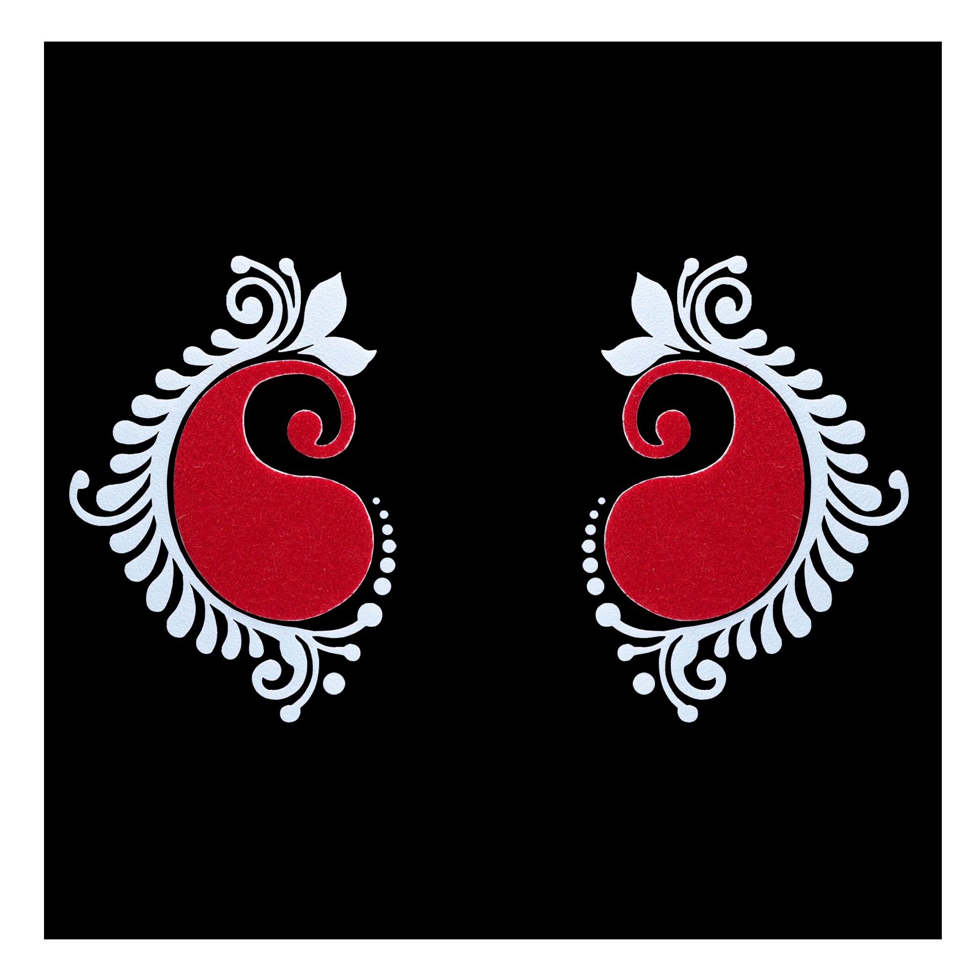 Comet Busters red paisley hand bindi sticker with white leafy border, spiral detailing and decorative dots