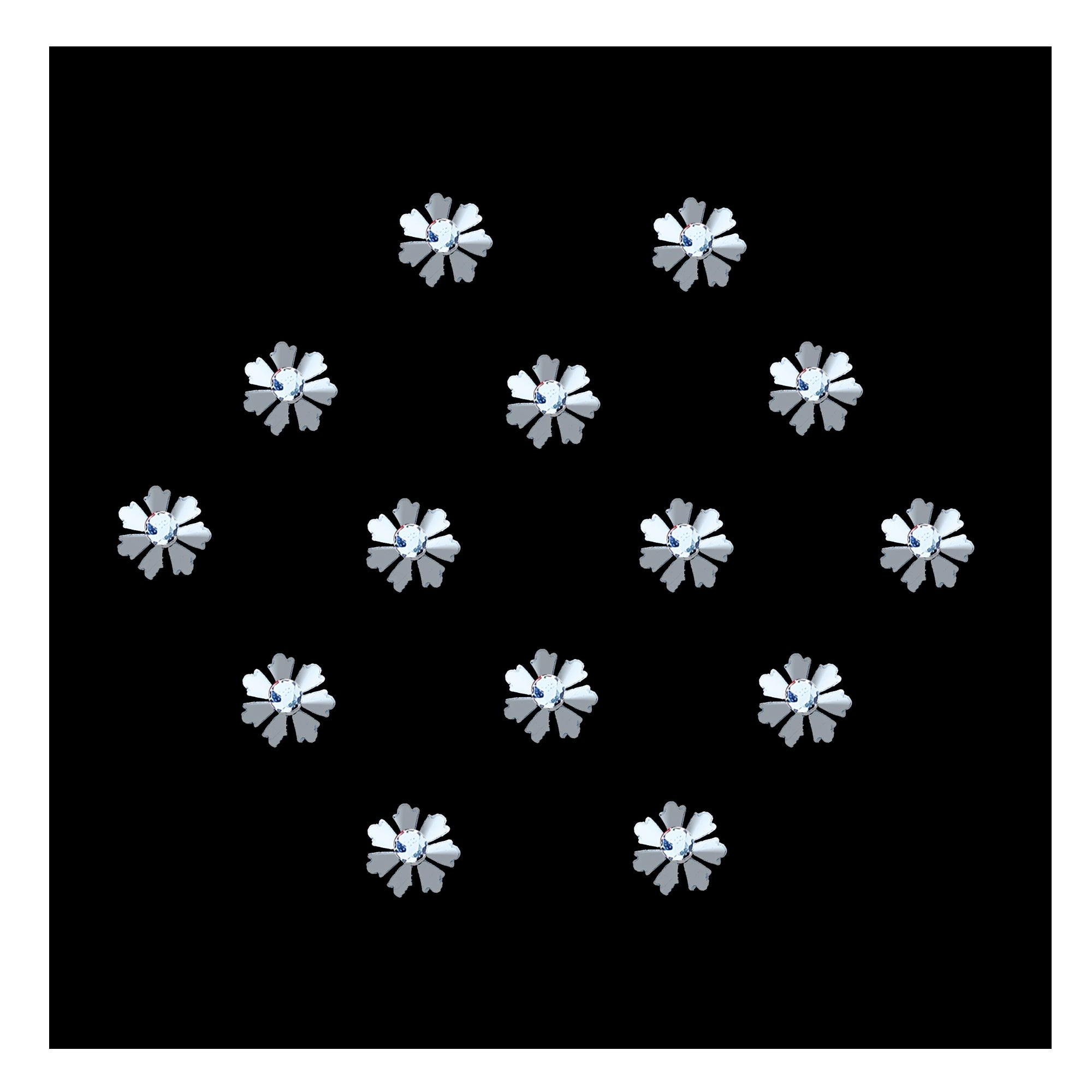 Silver floral designer bindi with petal-shaped detailing and sparkling crystal stone center, elegant stick-on forehead accessory for festive and ethnic wear.