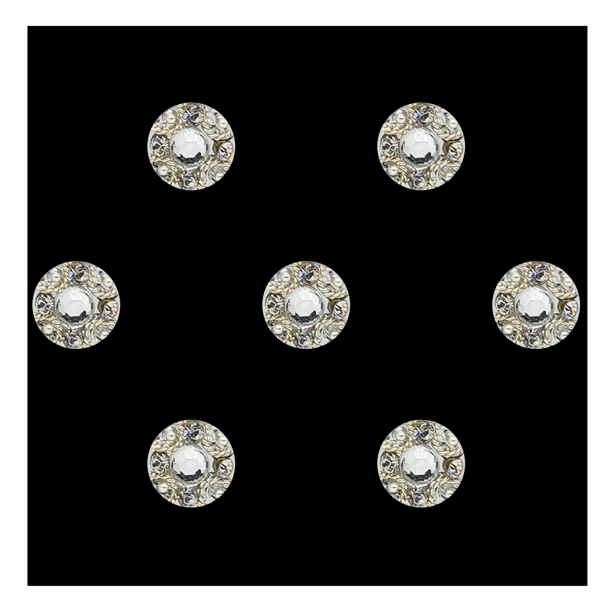 Comet Busters premium round silver bindis featuring a large central crystal stone surrounded by sparkling rhinestones and pearl detailing in a luxurious circular 9mm designer bindi style.