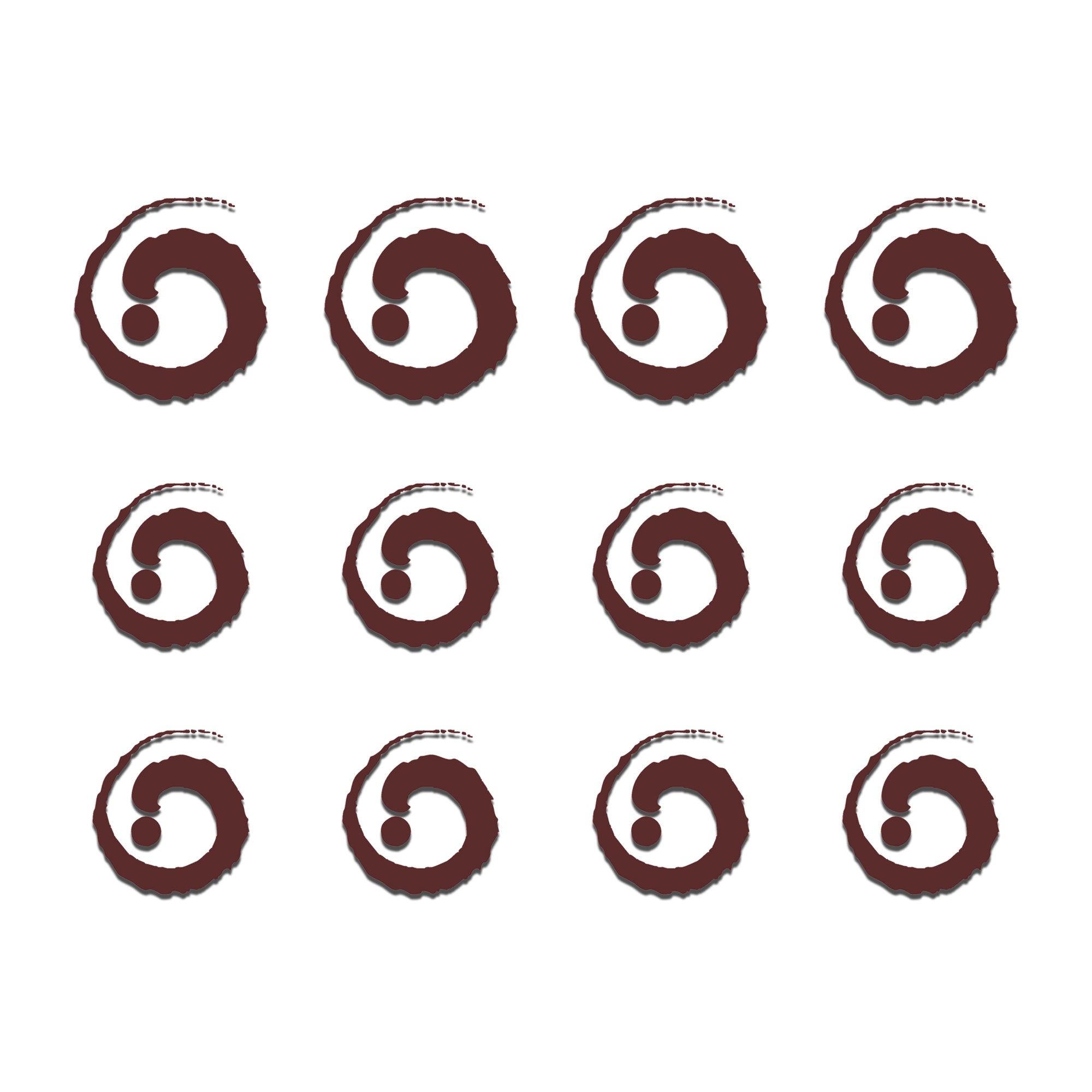 Comet Busters maroon spiral brush bindis featuring artistic circular swirl patterns