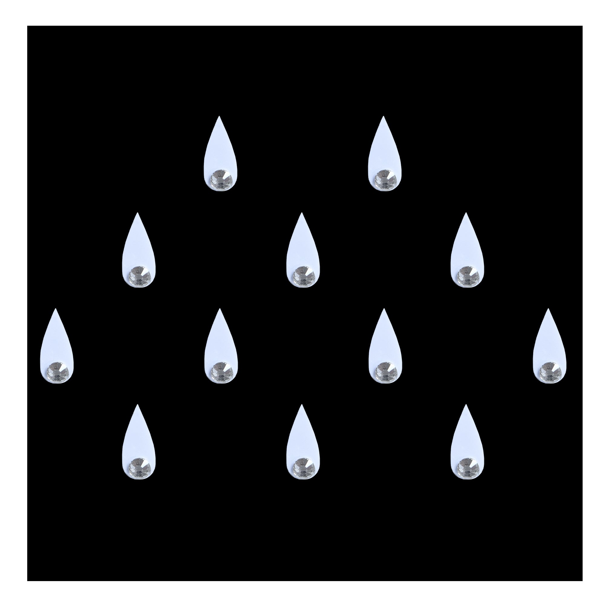 Comet Busters teardrop-shaped designer bindis featuring a sparkling silver crystal stone set within an elegant drop silhouette. Self-adhesive bindis perfect for festive occasions, weddings, ethnic wear, parties, and traditional Indian styling.