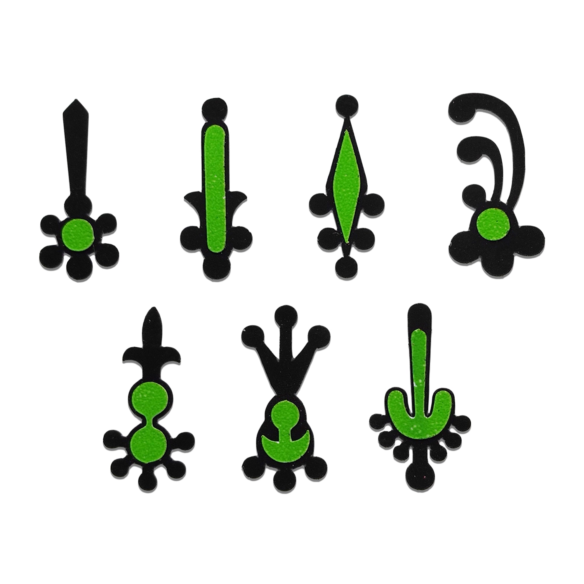 Comet Busters traditional green and black tilak designer bindi set featuring seven unique ornamental forehead sticker designs with a reusable skin-friendly finish for women and girls.