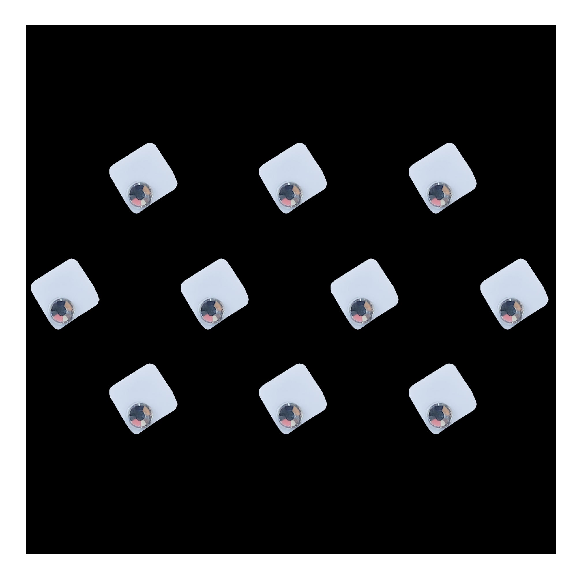 Comet Busters square crystal designer bindis featuring a modern geometric silver design with a sparkling crystal accent. Self-adhesive fashion bindis ideal for festive, ethnic, traditional, and contemporary styling.