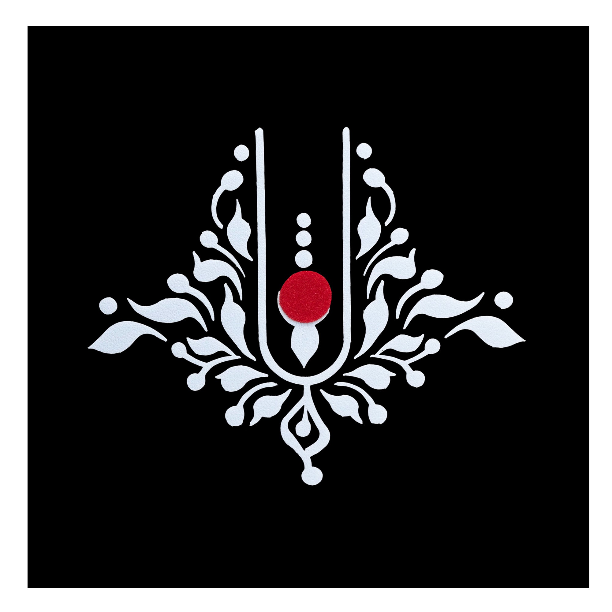 Comet Busters white long traditional designer bindi with intricate symmetrical floral patterns and a red round center, elegant Indian forehead accessory for women and girls
